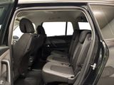 a car that has the door open and the seats down