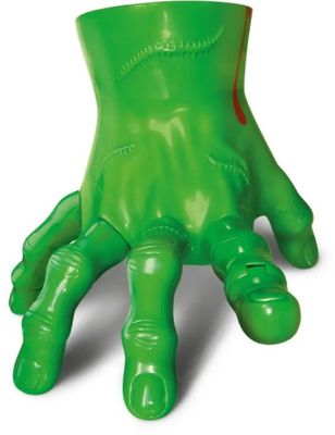 a close up of an inflatable green hand holding a cup