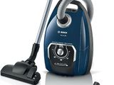 the vacuum is blue and has a silver handle