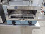 a toaster that is sitting on a counter in a kitchen