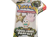 two packs of pokemon trading cards sitting on top of each other