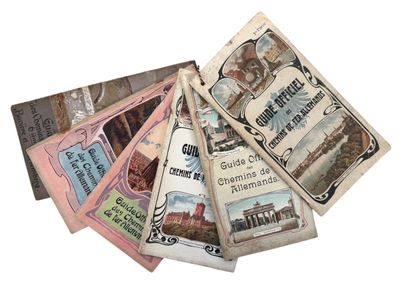 many different types of old postcards on a white surface