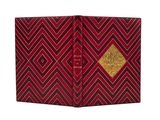 a red and gold book with a gold diamond on the cover