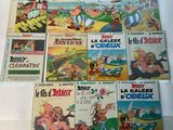 a lot of children ' s books that are on the table