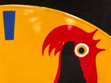 a yellow clock with a red bird painted on it
