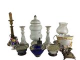a lot of vases that are sitting on a table