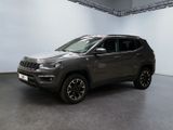 the jeep compass is parked in a large room with white walls