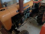 a tractor that is parked in a garage