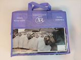 a purple bag with a picture of a bed in it