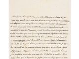 une lettre écrite à l'encre noire sur une feuille de papier