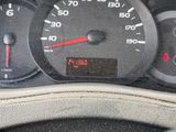 a close up of a car dashboard with a speedometer