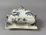 an antique blue and white tureeny dish with a lid