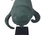 sculpture of a fish on a black stand
