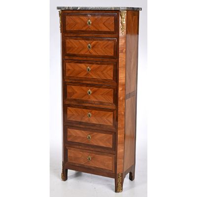 an image of a tall chest of drawers with a marble top