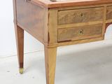a wooden desk with two drawers and a drawer on the top