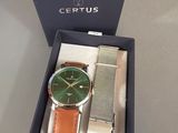 a box with a watch inside of it on a table