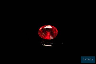 a red diamond on a black background