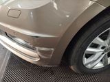 a close up of a car with a denting on it