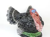 figurine of a turkey on a white background with a white background