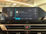 the dashboard of a car with the skyrock app on the display