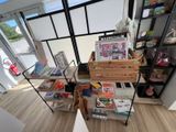 a room that has a lot of books on the shelves