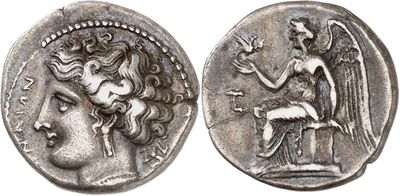 a silver coin with an image of a woman and a horse