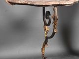 a person that is holding a table with a piece of wood on it
