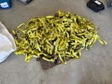 a pile of bananas on the ground next to a bag of bananas