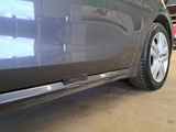 a close up of a car ' s side door with a sticker on it