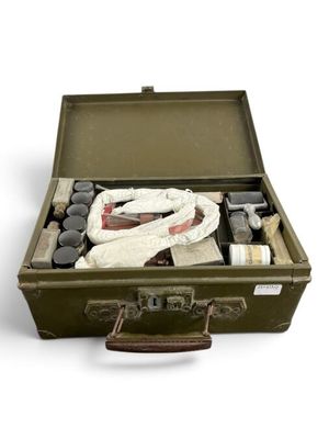 a suitcase that has a lot of items inside of it