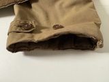 a close up of a pair of pants with buttons on them