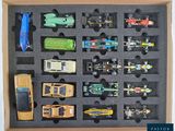 a box with a lot of toy cars in it