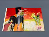 a book with a picture of a man riding a horse