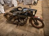 a motorcycle that is sitting in the middle of a room