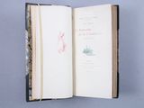 a book opened to show a picture of a ship