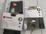 three different types of door locks on the floor