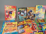 a lot of children ' s books that are on the table