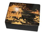a black and gold box with a painting on it