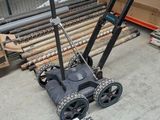 a cart that is sitting on the floor in a warehouse
