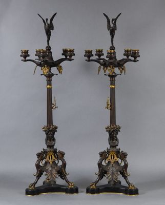 pair of antique bronze candlesticks with birds and flowers
