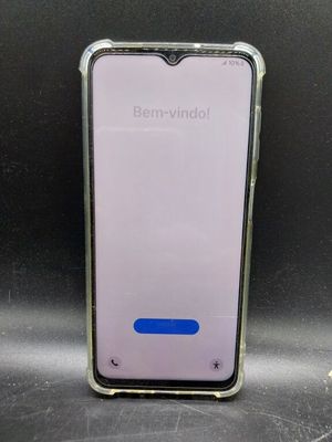a close up of a cell phone on a table with a black background