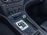 a close up of a car ' s dashboard with a number plate on it