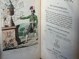 un livre ouvert sur lequel figure l'image d'un homme et d'un moulin à vent