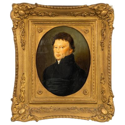 portrait d'un homme en manteau noir, encadré d'un cadre doré