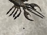 une photo d'un objet métallique sur le dos duquel se trouve un homard
