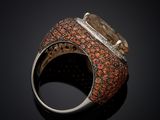 a close up of a ring with a stone on top of it