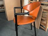 a chair that is sitting in the middle of a room