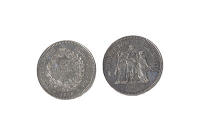 une image représentant deux pièces d'argent sur un fond blanc