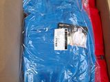 a box with a blue shirt and a red shirt in it