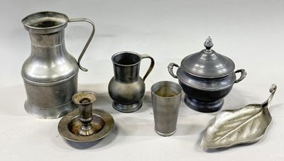 a lot of silver items that are on the table